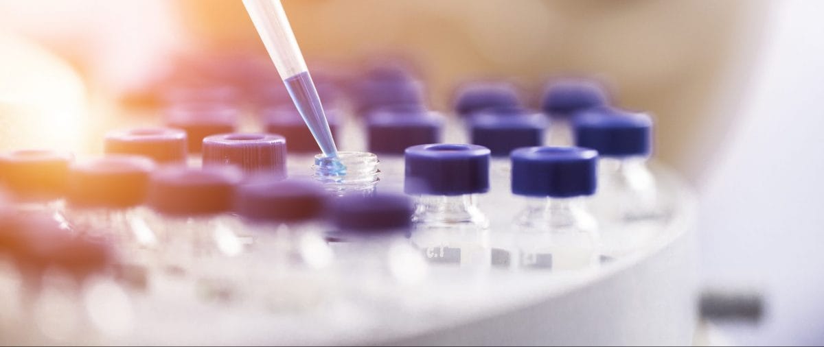 Person performing laboratory sampling
