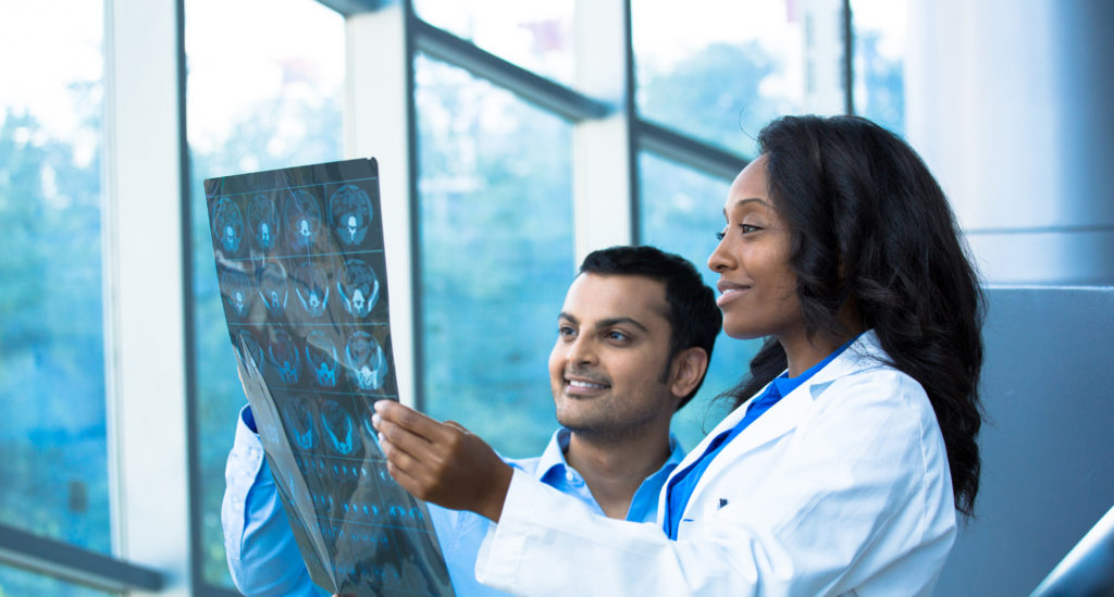 Doctors reviewing an abdominal x-ray