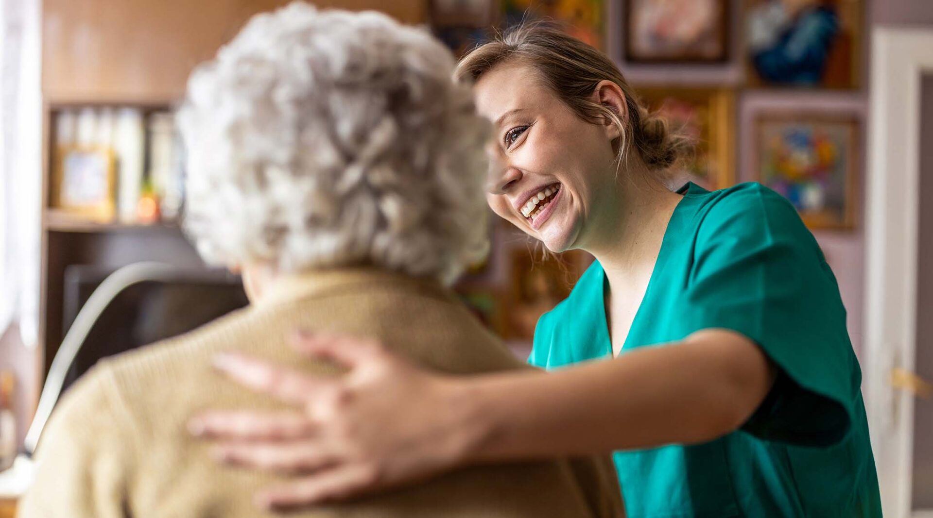 Nurse assisting an elderly lady