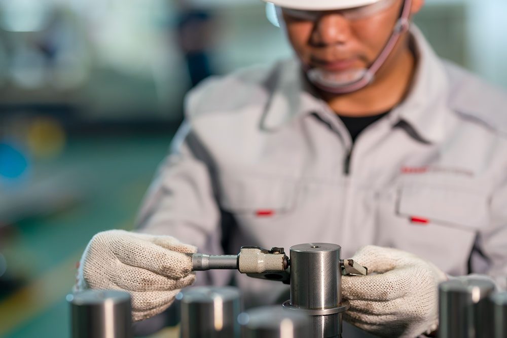 Man working on machinery in a factory